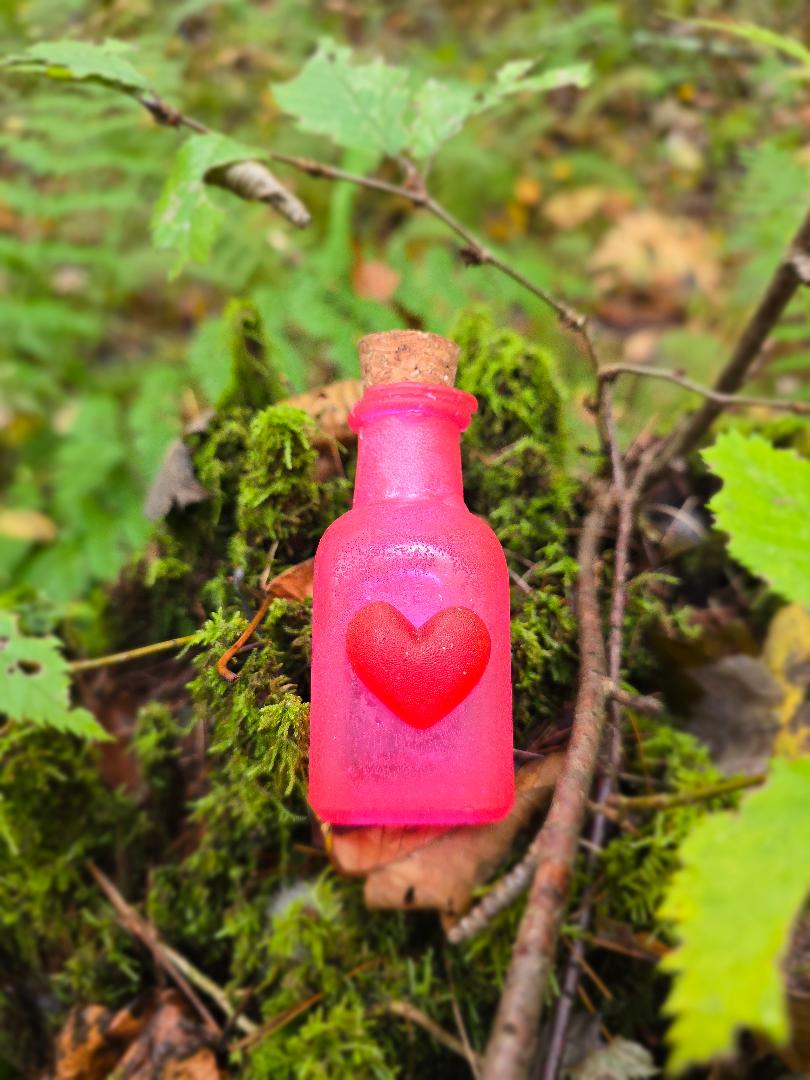The Raven Rose breakable love spell bottle